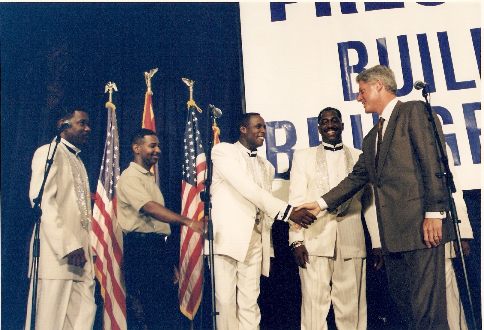 Theo Peoples shakes hands with President Clinton